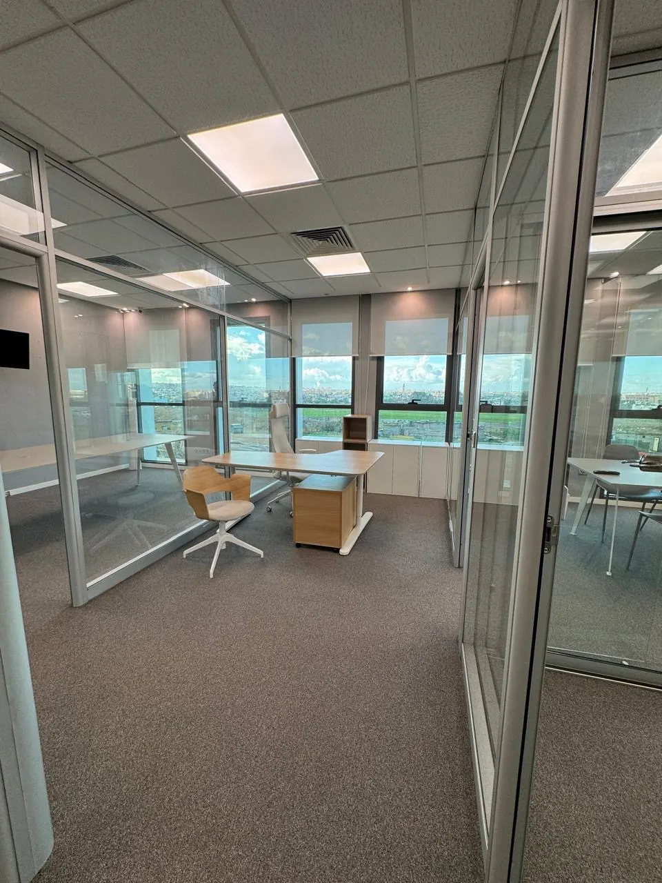 Bureau de direction NEXORA Expertise Comptable, Audit et Conseils avec vue sur Casablanca